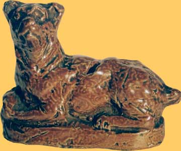 Sifflet en forme de chien couch�